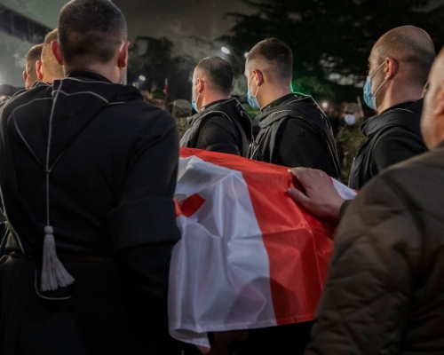 Фоторепортаж: В Грузию доставили погибших в Украине грузинских добровольцев